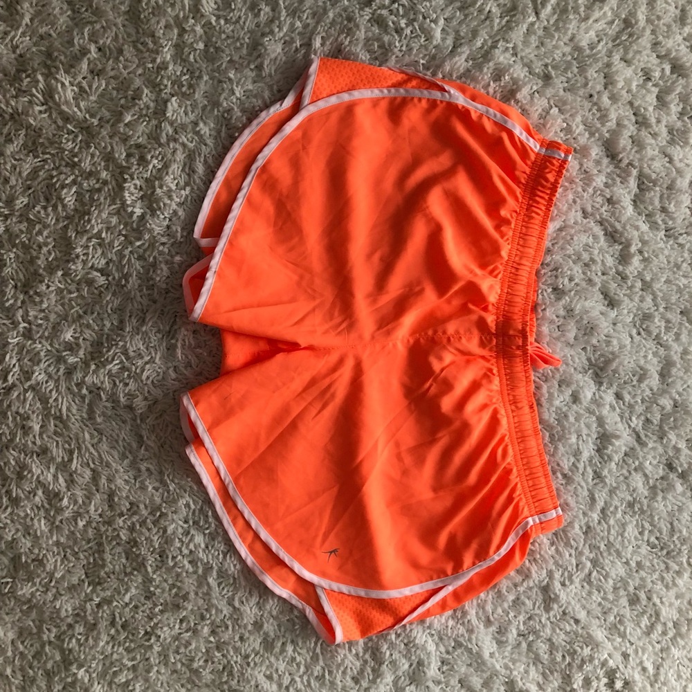 Never worn before Orange running shorts